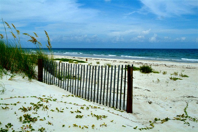 St. George Island wooden fence on beach